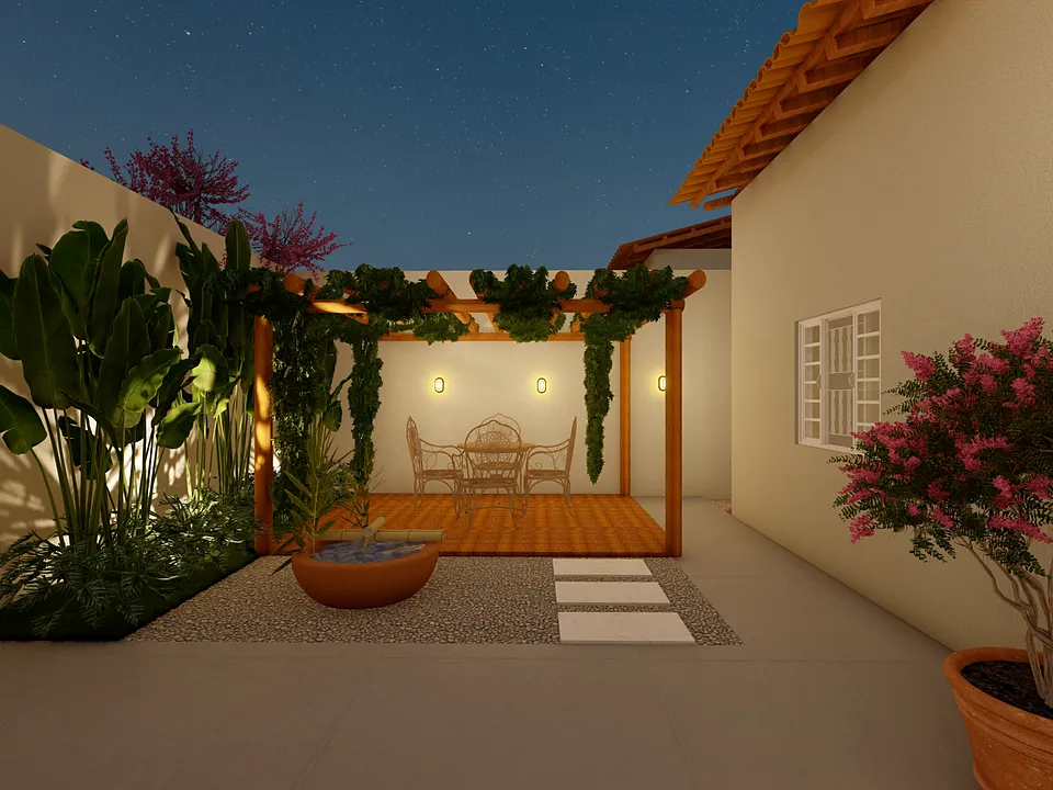 Jardim com iluminação noturna e deck coberto